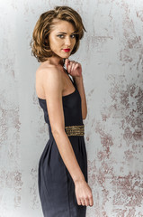 slim girl in black mini dress outlet