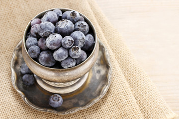 Blueberries in silver goblet
