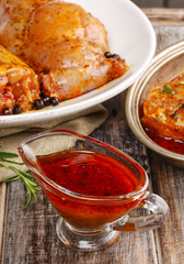 Honey and pepper red marinade in glass gravy boat