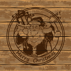 Santa Claus on a wooden boards