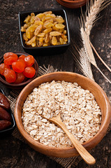 Cereal and dried fruit in a wooden bowl