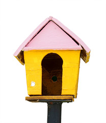 yellow wooden bird house on white background