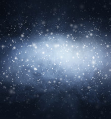 Smoke and falling snow on a dark blue background