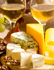 White wine with cheese and walnuts