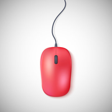 Red computer mouse on white
