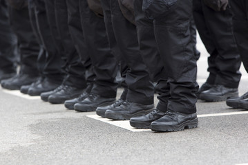 Policemen legs and boots