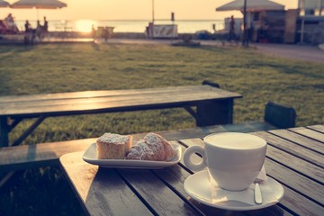 Cup of coffee and tasty biscuits