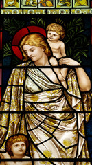 Woman withe children in stained glass