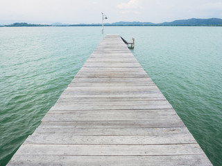Fototapeta premium wooden pier port landscape with ocean