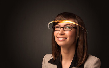 Pretty woman looking with futuristic high tech glasses