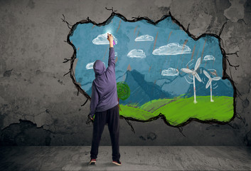 Young urban painter drawing