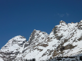 Alpine Thaw. Red Peaks on Spring