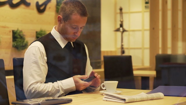 Businessman calling about advertisement in the gazette,steadycam