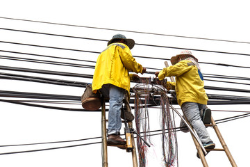 worker on bamboo ladder is repairing telephone line