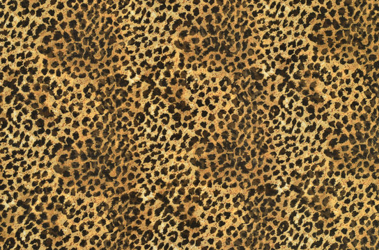 Brown and black leopard pattern.Spotted animal print background.