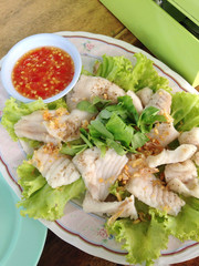 closed up boiled fish with spicy sauce