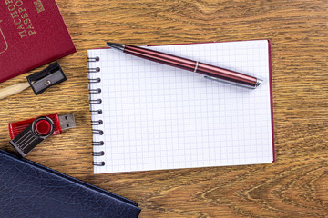 open notepad with pen on the desktop