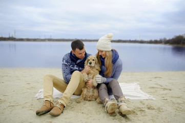 Fototapeta premium guy, girl and dog