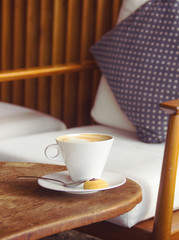 Fototapeta na wymiar cup of coffee in wooden interior