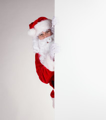 Santa Claus with blank board for text