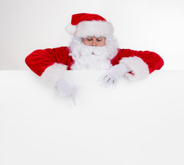 Santa Claus with blank board for text