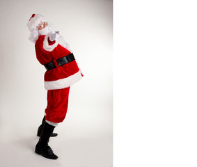 Santa Claus with blank board for text
