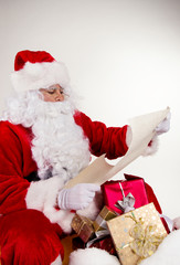 Santa Claus holding wish list
