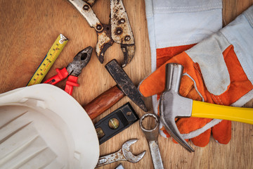 Closeup of assorted work tools on wood