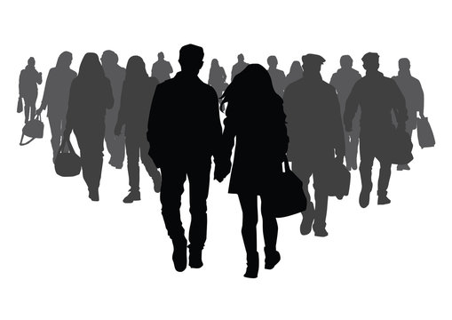 Silhouettes of people walking on the street