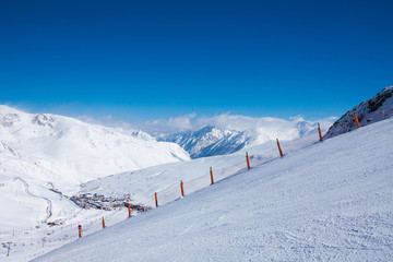 Fototapeta na wymiar Ski piste for ski in mountains