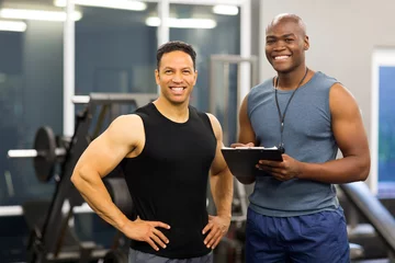 Gordijnen african american fitness instructor with client © michaeljung