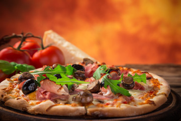 Delicious italian pizza served on wooden table