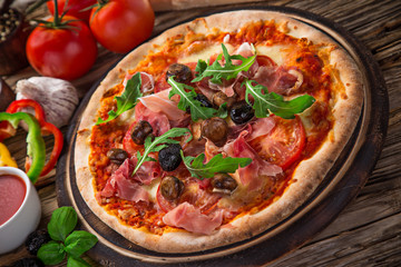 Delicious italian pizza served on wooden table