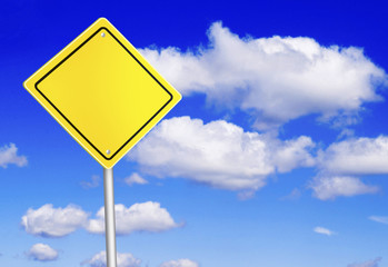 Safety road sign over the blue sky