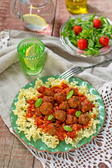 Pasta with mini meatballs with tomato sauce