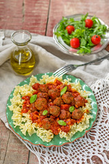 Pasta with mini meatballs with tomato sauce