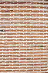 wall with red rectangular bricks