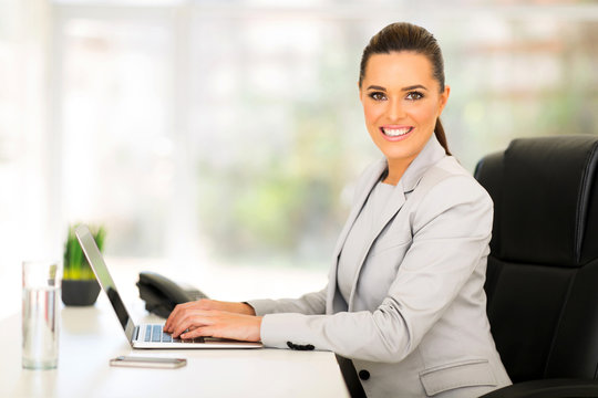 female corporate worker working in office