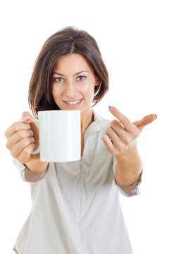 pretty woman offered white cup of coffee or tea to you or to cam