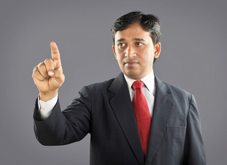 Indian Businessman pointing