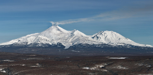 Fototapeta na wymiar Panorama: Avachinsky Volcano and Kozelsky Volcano. Kamchatka