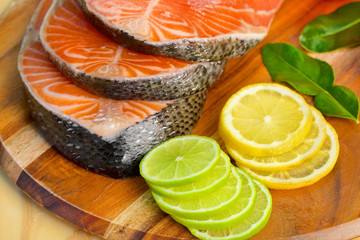 Delicious  portion of fresh salmon fillet with lemon