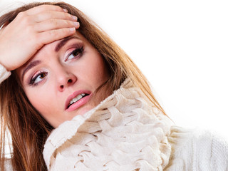 sick woman with fever and headache. Winter time.