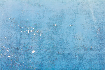 Concrete wall texture background blue and weathered old damage.