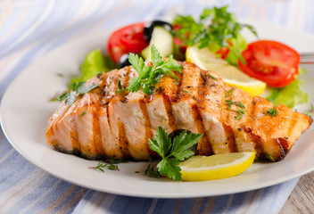 Salmon with a fresh salad.