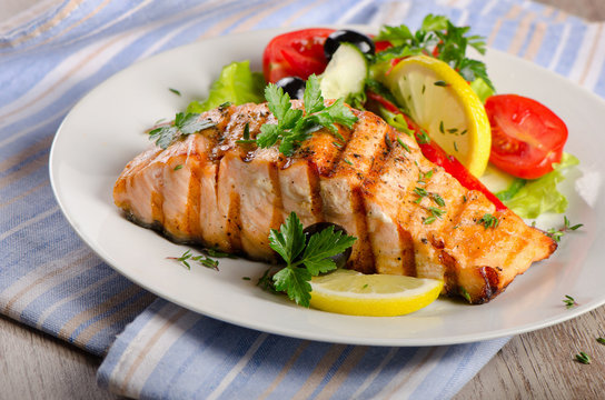 Grilled Salmon with  salad.