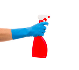 Hand holds spray bottle.
