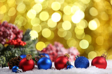 Fototapeta na wymiar Christmas balls on bright background