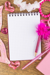 open notebook on a pink girly background