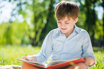 Boy in summer park